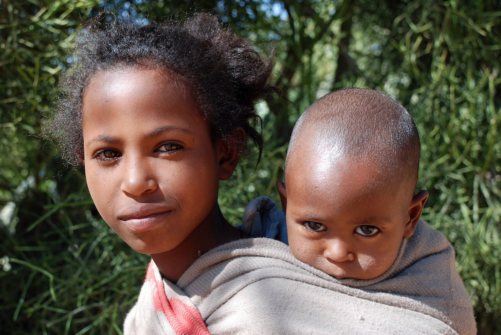 A mother and child in the Tigray Region of Ethiopia by Duncan JD Smith.