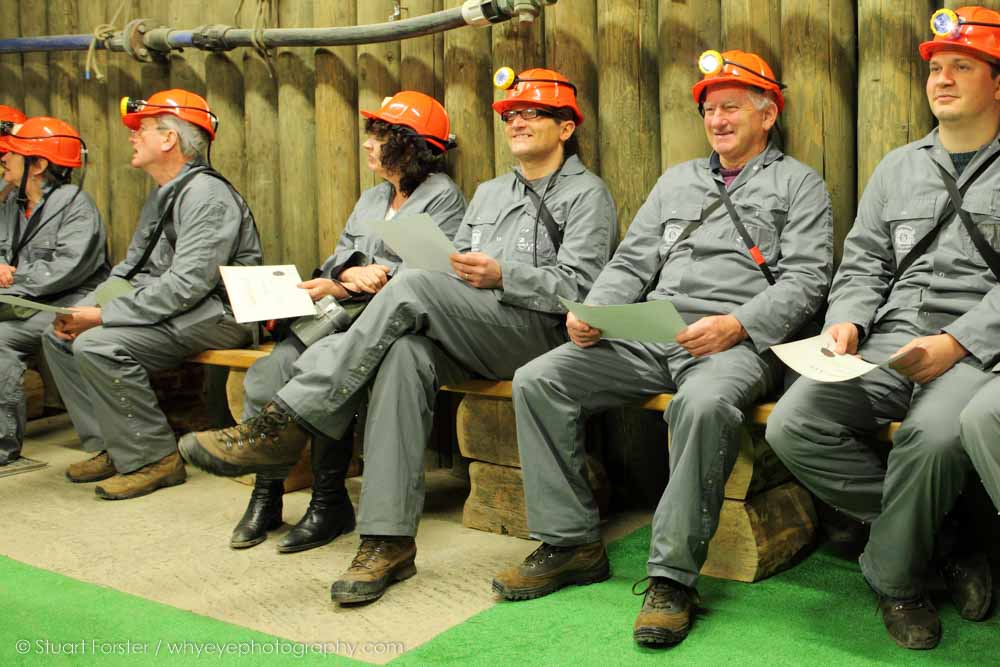 Guild members dressed in overalls and safety helmets to enter Wieliczka Salt Mine near Krakow in Poland