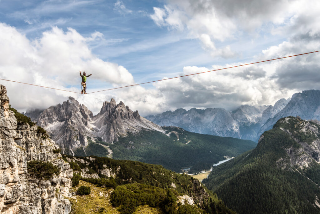 Highlining at Monte Piana, with views of the Cadini di Misurina, Italy